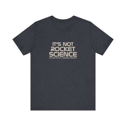 It’s Not Rocket Science (Unless You’re Launching Rockets) – Retro Tee (Dark)