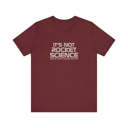 It’s Not Rocket Science (Unless You’re Launching Rockets) – Retro Tee (Dark)