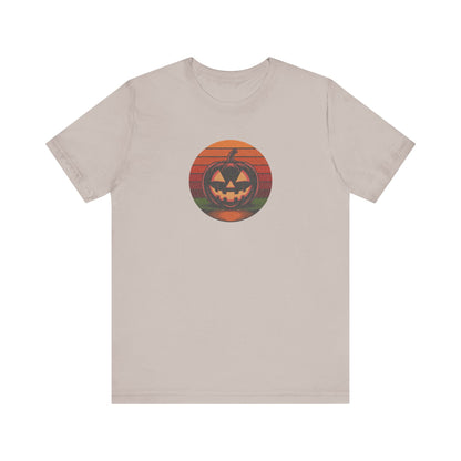 Retro Jack: Bold Grin — Halloween Sunset Tee (Light)
