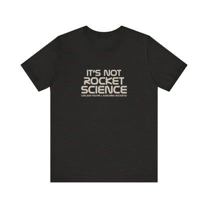 It’s Not Rocket Science (Unless You’re Launching Rockets) – Retro Tee (Dark)