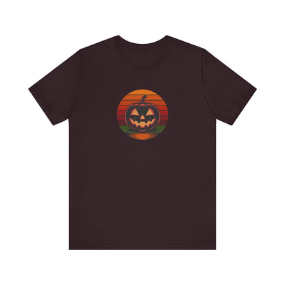 Retro Jack: Bold Grin — Halloween Sunset Tee (Dark)